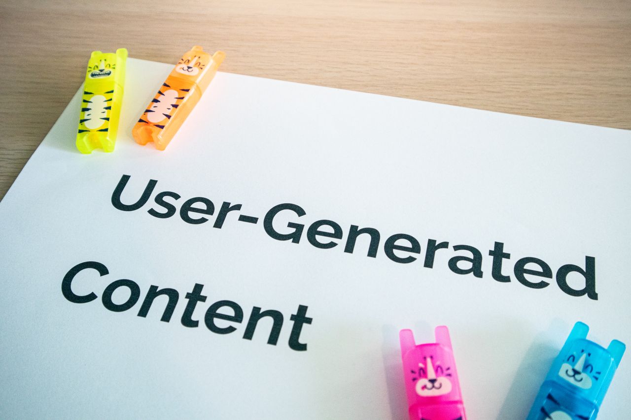 services-01 Vivid highlighters on a User-Generated Content note placed on a wooden desk.